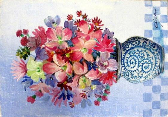 器とピンクの花